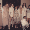 Kris Jenner, Khloé Kardashian, Kendall Jenner, Kourtney Kardashian, Kim Kardashian, Caitlyn Jenner et Kylie Jenner ainsi que la petite North West lors du défilé de mode Yeezus du rappeur et créateur Kanye West. Photo publiée sur Instagram, le 11 février 2016.