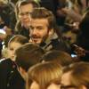 Harper Beckham, son père David et Brooklyn Beckham - David Beckham assiste au défilé de sa femme Victoria avec ses enfants Harper et Brooklyn à New York le 14 février 2016.