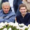 Patrick Poivre d'Arvor et son fils François assistent au 8e sacre de Rafael Nadal lors des Internationaux de France à Roland-Garros à Paris, le 9 juin 2013.