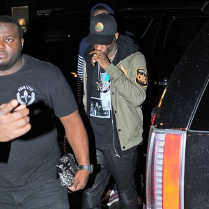 Rihanna et son petit ami Travis Scott à la sortie du club ‘Up and Down' à New York. Elle est porte une casquette avec inscription 'I came to break hearts' (je viens briser des coeurs!) Le 19 novembre 2015