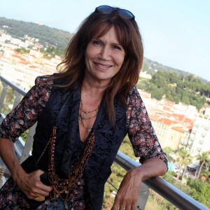 Exclusif - Clémentine Célarié pose à l'hôtel Aston à Nice, le 1er août 2014.