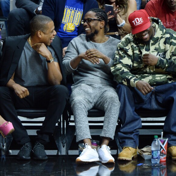 Beyoncé, Jay-Z, et Kendrick Lamar au Staples Center de Los Angeles lors de la rencontre entre les Clippers de Los Angeles et les Warriors de Golden State, le 20 février 2016