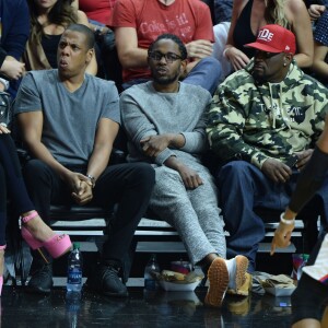 Beyoncé, Jay-Z, et Kendrick Lamar au Staples Center de Los Angeles lors de la rencontre entre les Clippers de Los Angeles et les Warriors de Golden State, le 20 février 2016