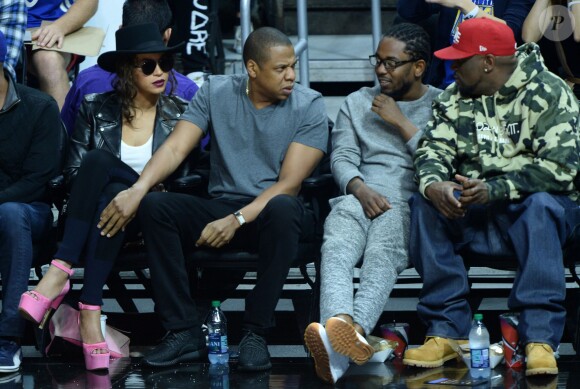 Beyoncé, Jay-Z, et Kendrick Lamar au Staples Center de Los Angeles lors de la rencontre entre les Clippers de Los Angeles et les Warriors de Golden State, le 20 février 2016