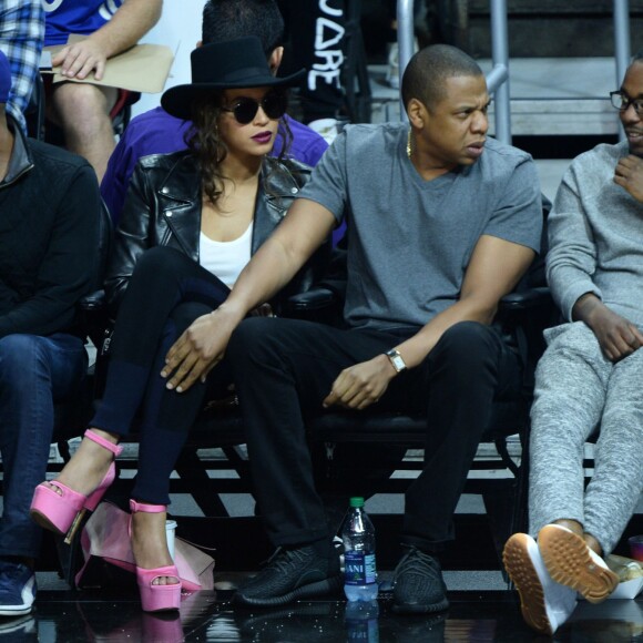 Beyoncé, Jay-Z, et Kendrick Lamar au Staples Center de Los Angeles lors de la rencontre entre les Clippers de Los Angeles et les Warriors de Golden State, le 20 février 2016