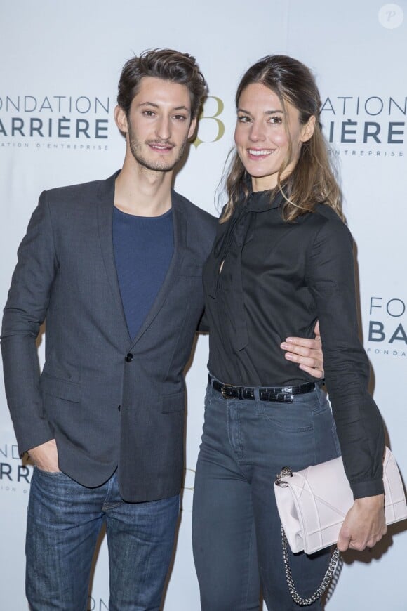 Pierre Niney et sa compagne Natasha Andrews - Avant Première du film "Five" prix cinéma 2016 de la Fondation Barrière à Paris le 14 mars 2016. © Olivier Borde/Bestimage