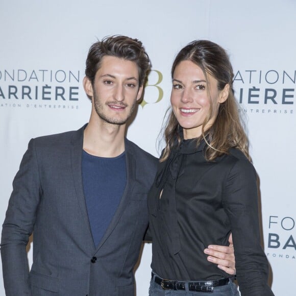 Pierre Niney et sa compagne Natasha Andrews - Avant Première du film "Five" prix cinéma 2016 de la Fondation Barrière à Paris le 14 mars 2016. © Olivier Borde/Bestimage