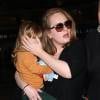 La chanteuse Adele et son fils Angelo Konecki arrivent à l'aéroport LAX de Los Angeles le 3 janvier 2015
