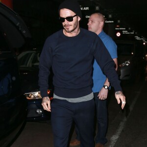 David Beckham et ses enfants Brooklyn, Romeo, Cruz et Harper arrivent à l'aéroport LAX de Los Angeles, le 24 mars 2016.