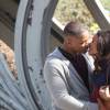 Will Smith embrasse sa partenaire Naomie Harris pour une scène du film "Collateral Beauty" à New York le 6 avril 2016. Dans le film, le personnage joué par Naomie Harris est enceinte.