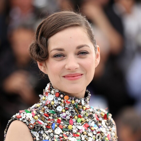 Marion Cotillard - Photocall du film "Deux jours, une nuit" lors du 67e festival international du film de Cannes, le 20 mai 2014.