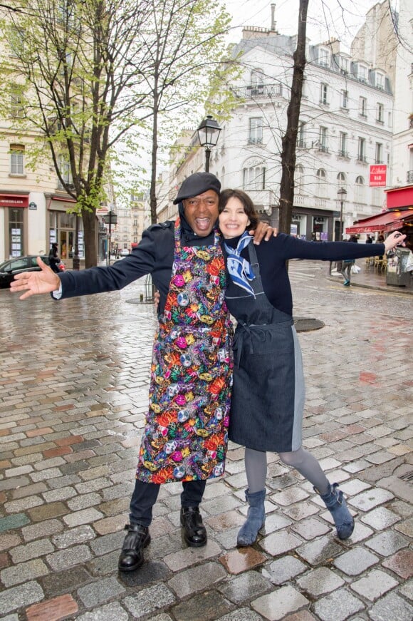 Leee John (Chanteur du groupe Imagination) et la créatrice Zélia lors de la présentation de la Collection de Tabliers Zezette by Montmartre, a Paris le 17 Avril 2016.