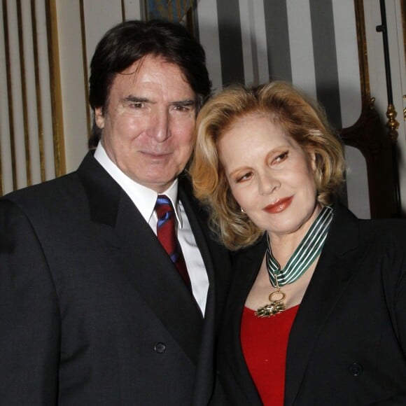 Tony Scotti et Sylvie Vartan à Paris le 14 décembre 2011
 