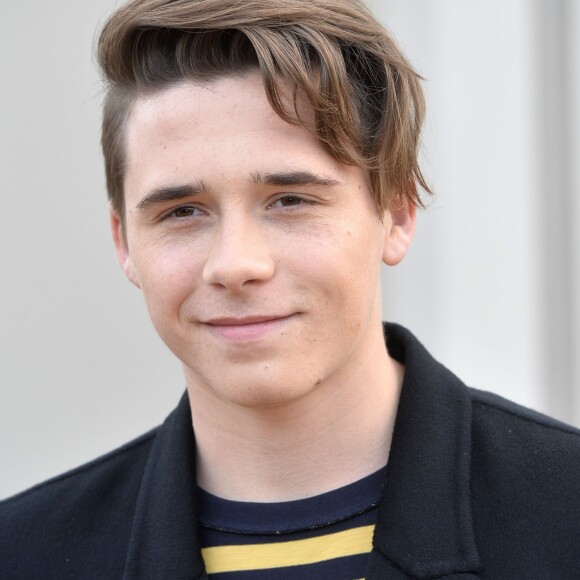 Brooklyn Beckham lors du défilé Burberry Prorsum Hommes Printemps-Eté 2016 à Londres, le 11 janvier 2016.