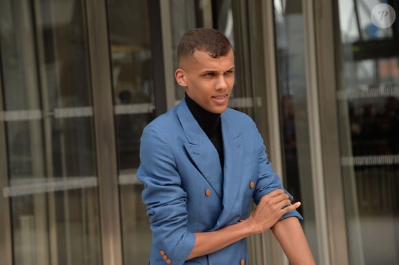 Stromae au défilé de mode "Louis Vuitton", collection prêt-à-porter automne-hiver 2015/2016, à Paris. Le 11 mars 2015