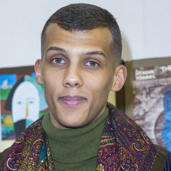 Le chanteur Stromae au défilé de mode hommes Valentino collection prêt-à-porter Automne Hiver 2015/2016 à l'hôtel Salomon de Rothschild à Paris, le 21 janvier 2015