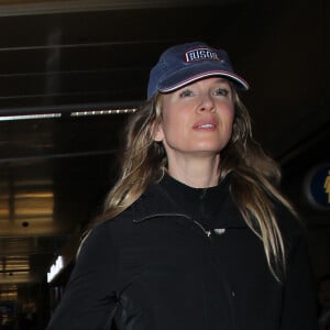 Renee Zellweger et son compagnon Doyle Bramhall arrivent à l'aéroport de LAX à Los Angeles, le 26 février 2016