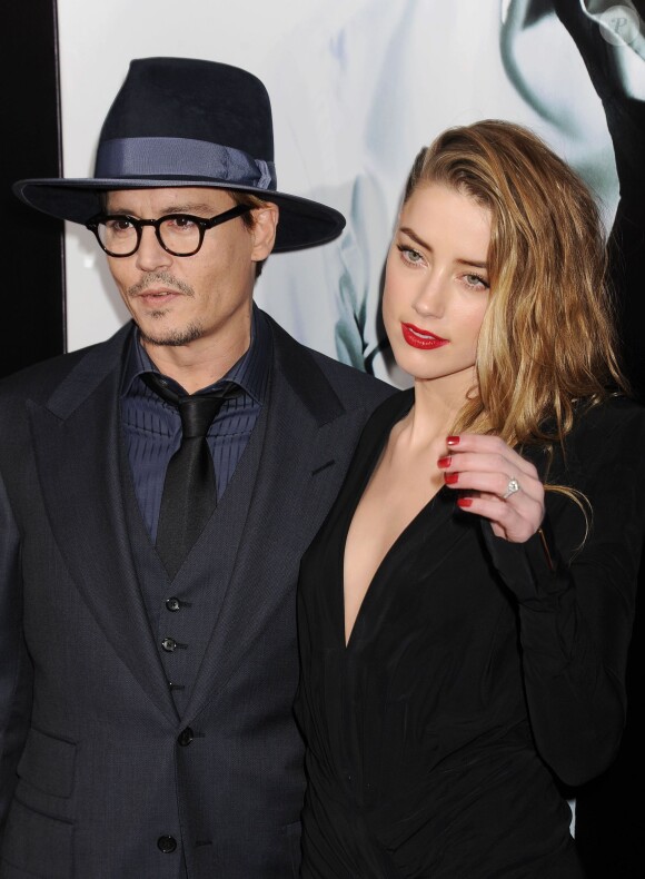 Johnny Depp et sa fiancée Amber Heard - Première du film "3 Days to Kill" à Hollywood, le 12 février 2014.