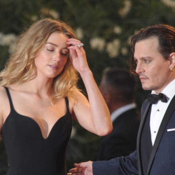 Johnny Depp et sa femme Amber Heard - Tapis rouge du film Black Mass (Strictly Criminal) lors du 72ème festival du film de Venise (la Mostra), le 4 septembre 2015.