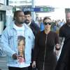 Kim Kardashian et Kanye West arrivent à l'aéroport de Rome. Le couple doit assister à l'opéra "La Traviata", spectacle organisé par Valentino. Le 22 mai 2016