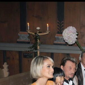 EXCLUSIF - MONSEIGNEUR JACQUES BANDERET, JOHNNY ET LAETICIA HALLYDAY, LEURS FILLES JADE ET JOY, JEAN CLAUDE DARMON (PARRAIN) - BAPTEME DE JOY HALLYDAY EN L'EGLISE DE LAUENEN (SUISSE) 05/07/2009 - LAUENEN