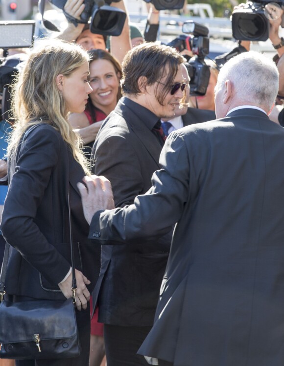 Johnny Depp et sa femme Amber Heard arrivent au tribunal de Southport pour le procès dans lequel est impliquée Amber pour avoir fait entrer sur le territoire ses chiens Pistol et Boo sans les déclarer à Southport le 18 Avril 2016.
