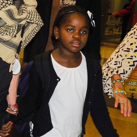Madonna et ses enfants David, Mercy et Lourdes arrivent à New York en provenance de Londres le 3 septembre 2013.