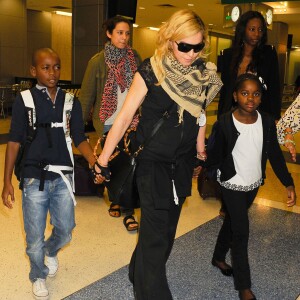 Madonna et ses enfants David, Mercy et Lourdes arrivent à New York en provenance de Londres le 3 septembre 2013.