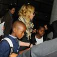 Madonna et ses enfants David, Mercy et Lourdes arrivent a New York en provenance de Londres le 3 septembre 2013.