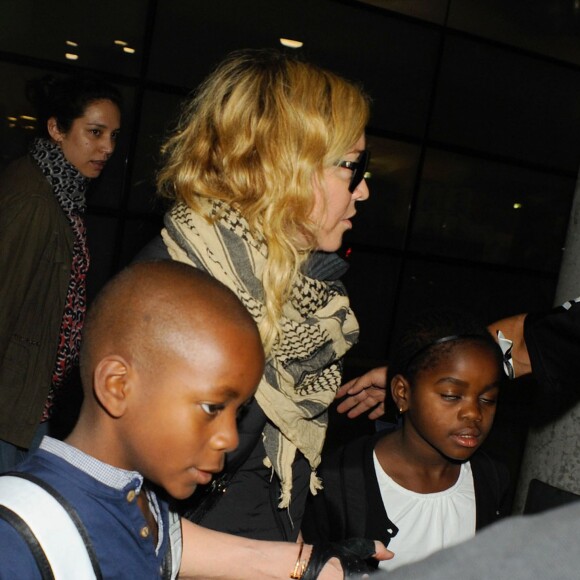 Madonna et ses enfants David, Mercy et Lourdes arrivent a New York en provenance de Londres le 3 septembre 2013.