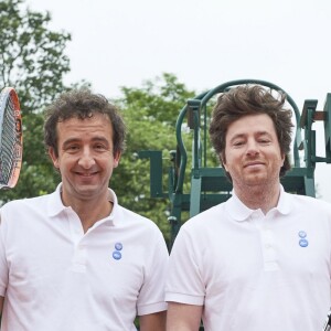 Cyrille Eldin et Jean Imbert lors de leur demi-finale au troisième et dernier jour du Trophée des Personnalités de Roland-Garros 2016, vendredi 3 juin 2016.