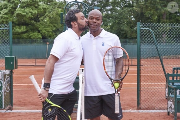 Cyril Hanouna et Sylvain Wiltord lors de leur finale au terme de la troisième et dernière journée du Trophée des Personnalités de Roland-Garros 2016, vendredi 3 juin 2016.