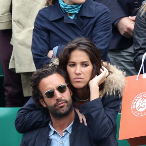 Laurie Cholewa et son nouveau compagnon dans les tribunes des internationaux de France de Roland Garros à Paris le 4 juin 2016. © Moreau - Jacovides / Bestimage