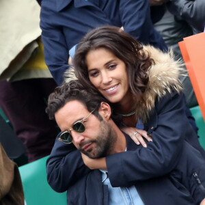 Laurie Cholewa et son nouveau compagnon : couple amoureux dans les tribunes des internationaux de France de Roland Garros à Paris le 4 juin 2016. © Moreau - Jacovides / Bestimage