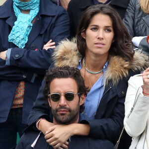 Laurie Cholewa et son nouveau compagnon dans les tribunes des internationaux de France de Roland Garros à Paris le 4 juin 2016. © Moreau - Jacovides / Bestimage