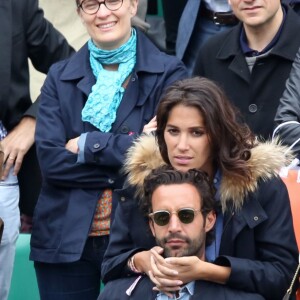 Laurie Cholewa et son nouveau compagnon dans les tribunes des internationaux de France de Roland Garros à Paris le 4 juin 2016. © Moreau - Jacovides / Bestimage