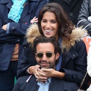 Laurie Cholewa et son nouveau compagnon dans les tribunes des internationaux de France de Roland Garros à Paris le 4 juin 2016. © Moreau - Jacovides / Bestimage