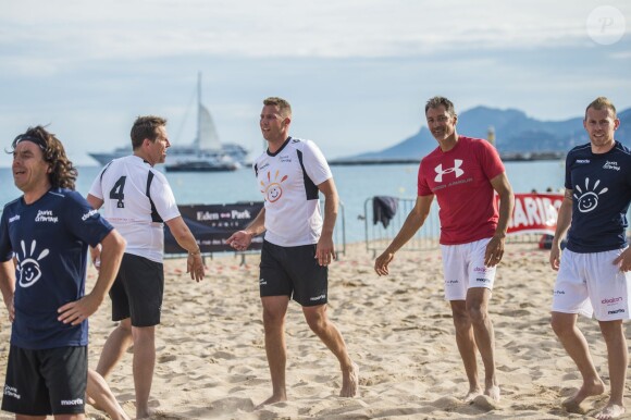 Thierry Glowacz, Kristian Knudsen, Anthony Lopez-Peralta, Maxime Montay lors du match de gala du 2e Beach Soccer à Cannes au profit de l'association Sourire et Partage, sur la plage Macé le 1er juin 2016