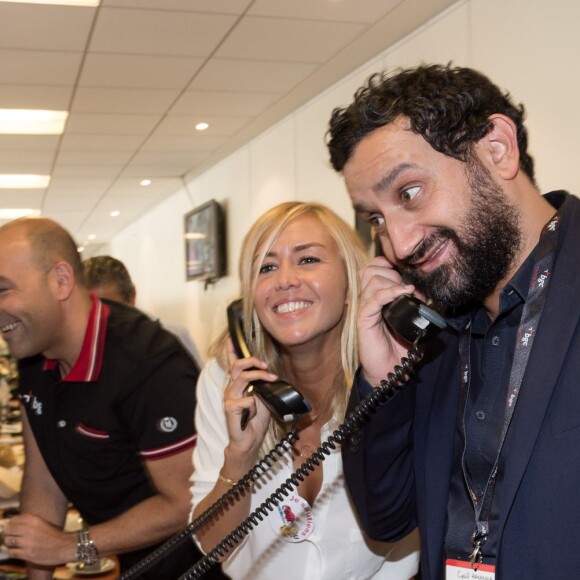 Cyril Hanouna et Enora Malagré - 11e édition du "BGC Charity Day" à Paris le 11 septembre 2015 en mémoire aux 658 collaborateurs du groupe BGC partners (leader mondial du courtage interbancaire) disparus il y a 14 ans dans les attentats du World Trade Center le 11 septembre 2001.