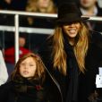 Cathy Guetta et son fils Tim Elvis lors du match PSG-APOEL Nicosie à Paris le 5 novembre 2014.