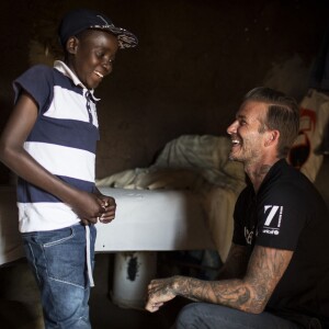 David Beckham, ambassadeur de bonne volonté de l'UNICEF rend visite à des enfants séropositifs au Swaziland en Afrique du Sud le 7 juin 2016.