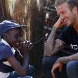 David Beckham, ambassadeur de bonne volonté de l'UNICEF rend visite à des enfants séropositifs au Swaziland en Afrique du Sud le 7 juin 2016.