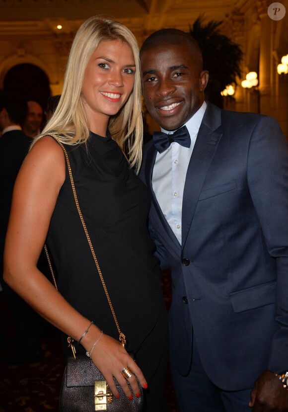 Rio Mavuba et sa femme Elodie - Gala de charité organisé par Romain Grosjean au profit de l'association "Enfance et Cancer" à l'hôtel InterContinental à Paris, le 9 septembre 2015.