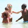 Exclusif - Rio Mavuba et sa femme Elodie, ainsi que leurs deux enfants Uma et Tiago, en vacances au Lavandou le 10 juillet 2014.