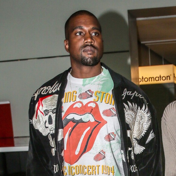 Kim Kardashian et son mari Kanye West arrivent à l'aéroport de Roissy-Charles-de-Gaulle, puis vont déjeuner au restaurant "L'Avenue" à Paris, le 13 juin 2016.