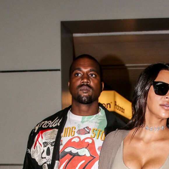 Kim Kardashian et son mari Kanye West arrivent à l'aéroport de Roissy-Charles-de-Gaulle, puis vont déjeuner au restaurant "L'Avenue" à Paris, le 13 juin 2016.
