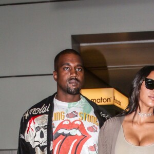 Kim Kardashian et son mari Kanye West arrivent à l'aéroport de Roissy-Charles-de-Gaulle, puis vont déjeuner au restaurant "L'Avenue" à Paris, le 13 juin 2016.