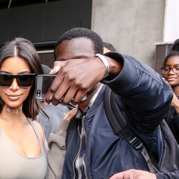 Kim Kardashian et son mari Kanye West arrivent à l'aéroport de Roissy-Charles-de-Gaulle, puis vont déjeuner au restaurant "L'Avenue" à Paris, le 13 juin 2016.