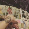 Paris Jackson, la fille de Michael Jackson, compte désormais 23 tatouages dont une tête de loup sur l'avant bras. Photo publiée sur sa page Instagram, au début du mois de juin 2016