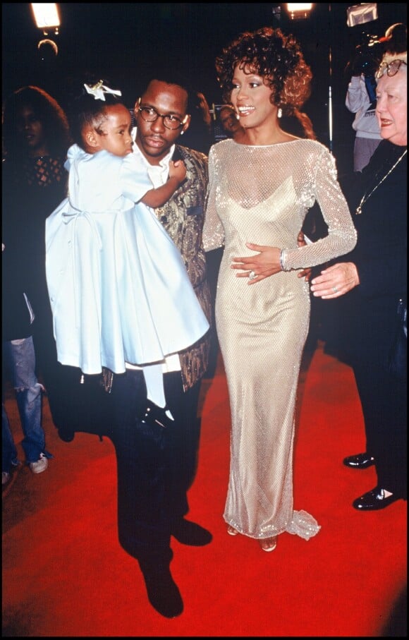Whitney Houston et son mari Bobby Brown ainsi leur fille Bobbi Kristina à la première de Cinderella, le 22 octobre 1997